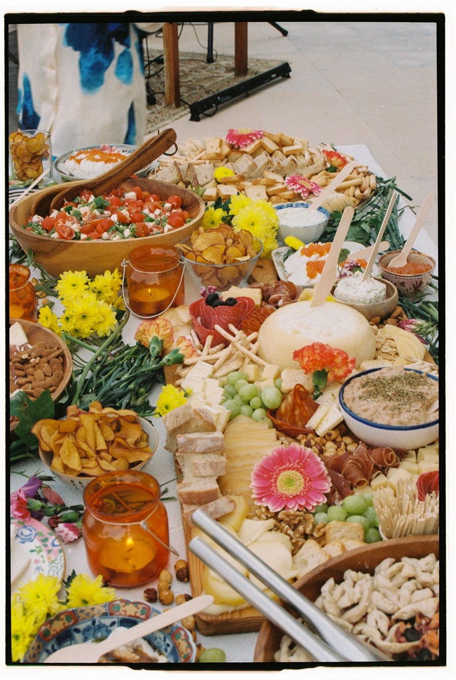 A vibrant grazing table styled for a birthday celebration